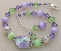 faerieflash purple rose lampwork bracelet with vintage lucite.jpg