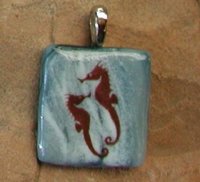 squidglass seahorses pendant in fused glass.jpg