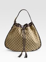 Gucci Med drawstring shoulder bag.jpg