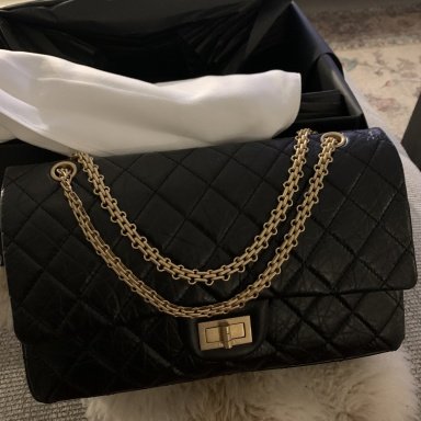 chanel quilted camera bag