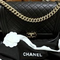 Buy Chanel Shiny Black Caviar Chevron Boy Bag  Luxury Pre-Owned Chanel  Handbags on Sale – REDELUXE