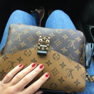 Classic LV bag! I never thought the red lining would widen the