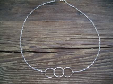 ninadinoffthreeringsnecklace.jpg