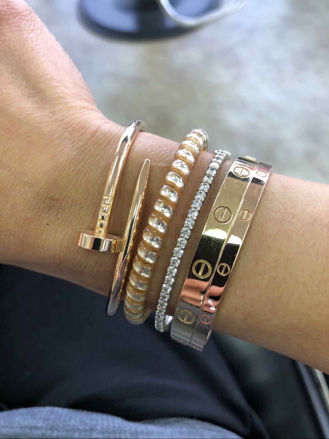 Cartier love + juc stacked bracelets 