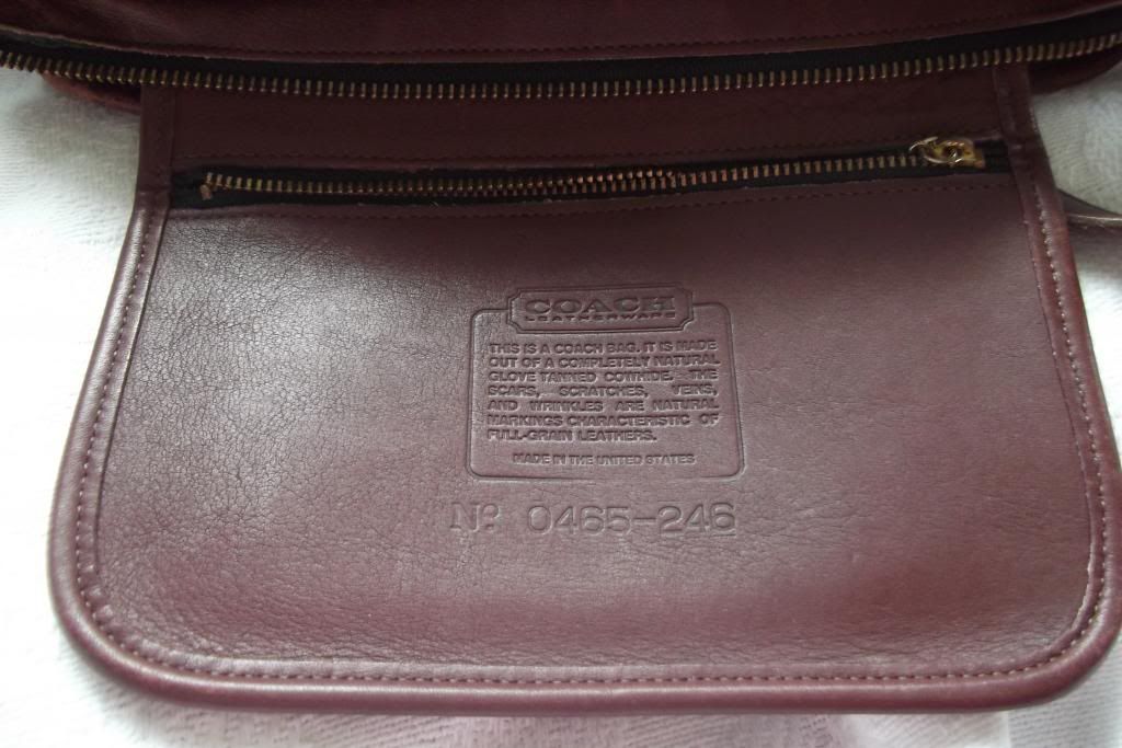 Coach Authenticated Leather Clutch Bag