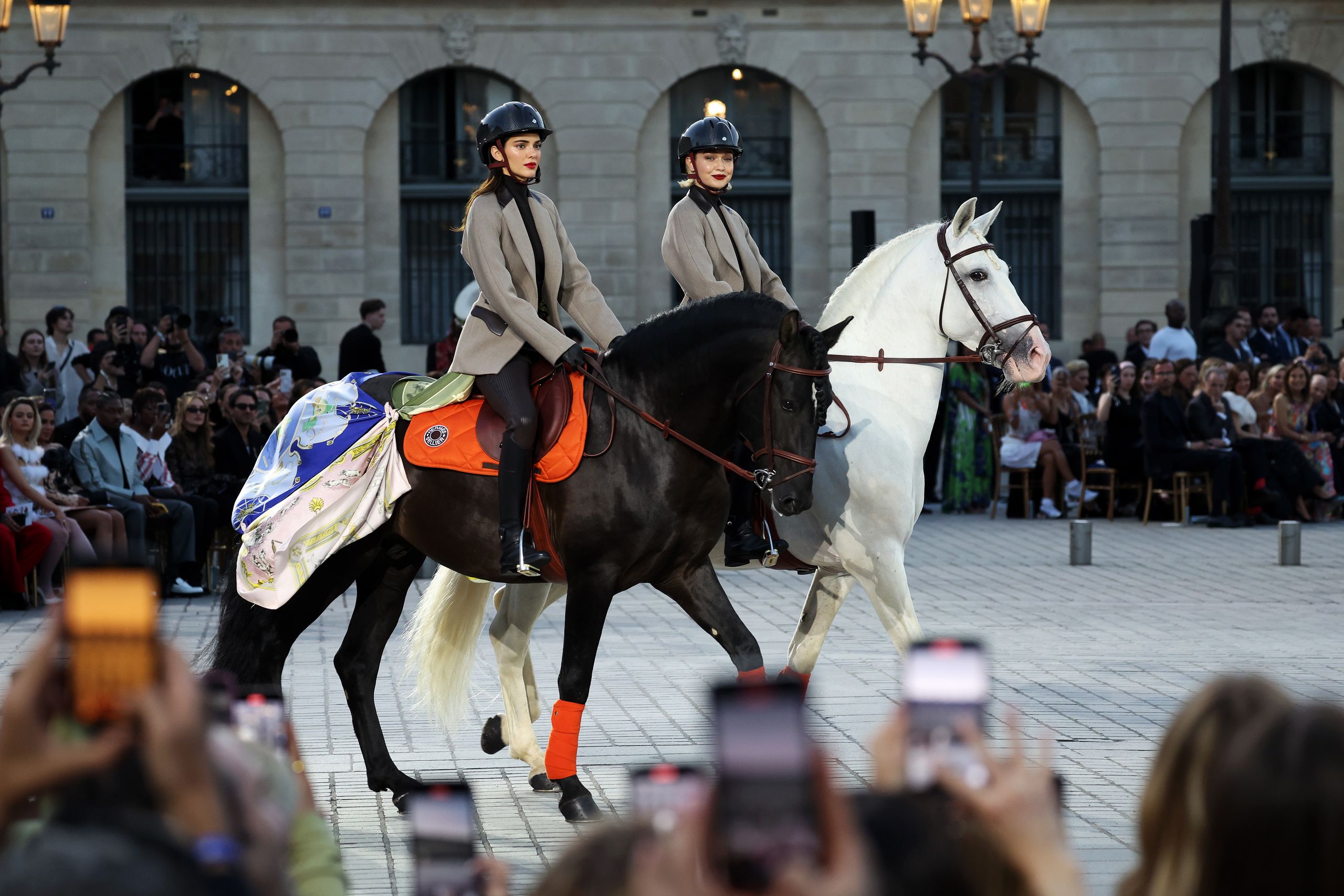 Image may contain Helmet Clothing Glove Person Teen Adult Footwear Shoe Animal Horse and Horseback Riding
