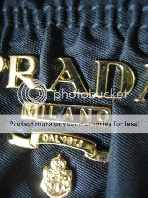 Slightly Tarnished Prada Logo. Please Help! | PurseForum