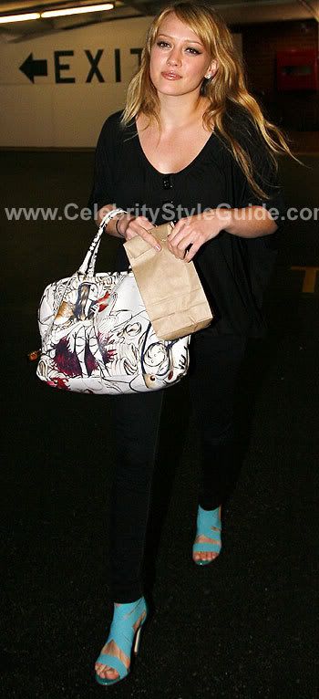 Hilarysergiorossiblueshoes.jpg