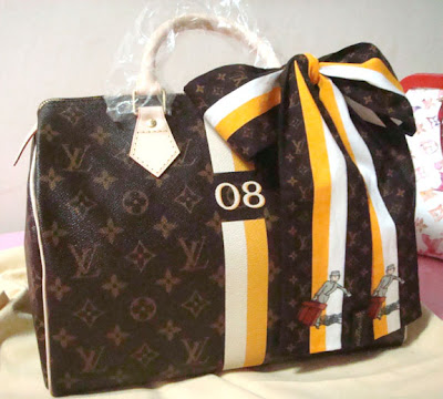 Louis Vuitton Monogram Motard Clutch - PurseBlog